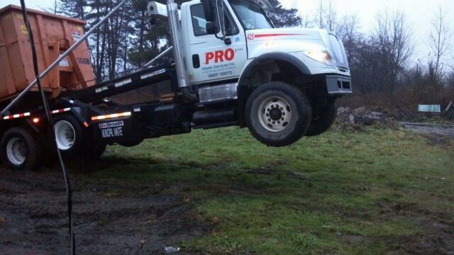 Pro Waste Services Truck in the air - Pro Waste Services Inc.